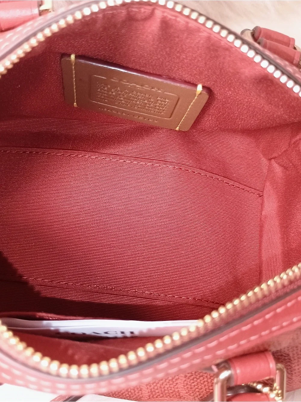 Coach purse Mini Rowan Crossbody Bag In Signature Canvas in Crimson color New